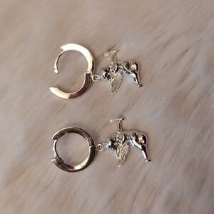 XEVRY| Silver Plated Cupid With Arrow Closed Clasp Earrings